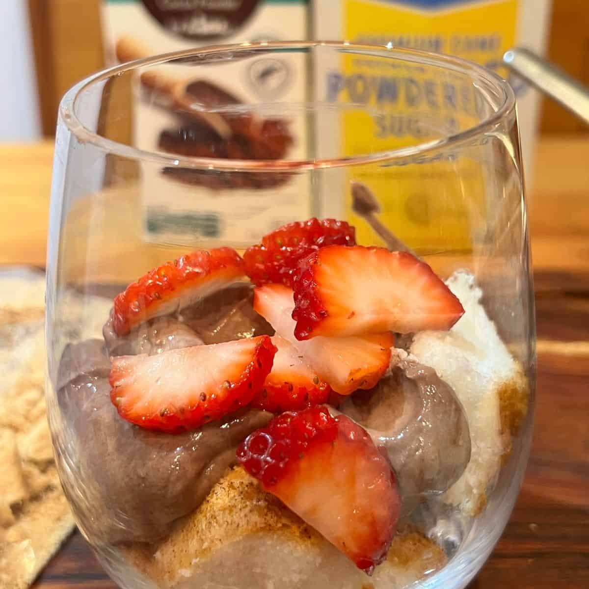 Chopped strawberries in a parfait glass