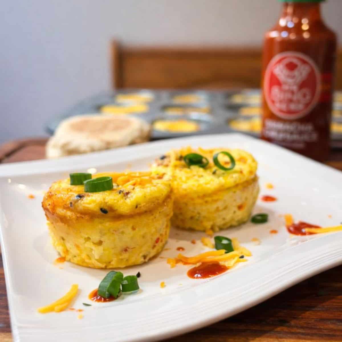  Two Easy High Protein Egg Bites with Cottage Cheese on a white plate