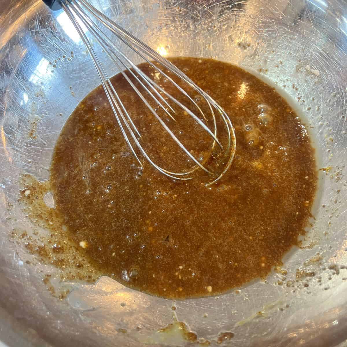 Coconut sugar and avocado oil being mixed in a bowl
