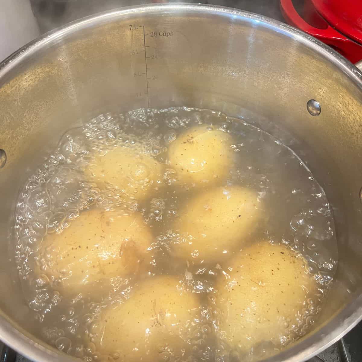 Boiling potatoes in a stock pot
