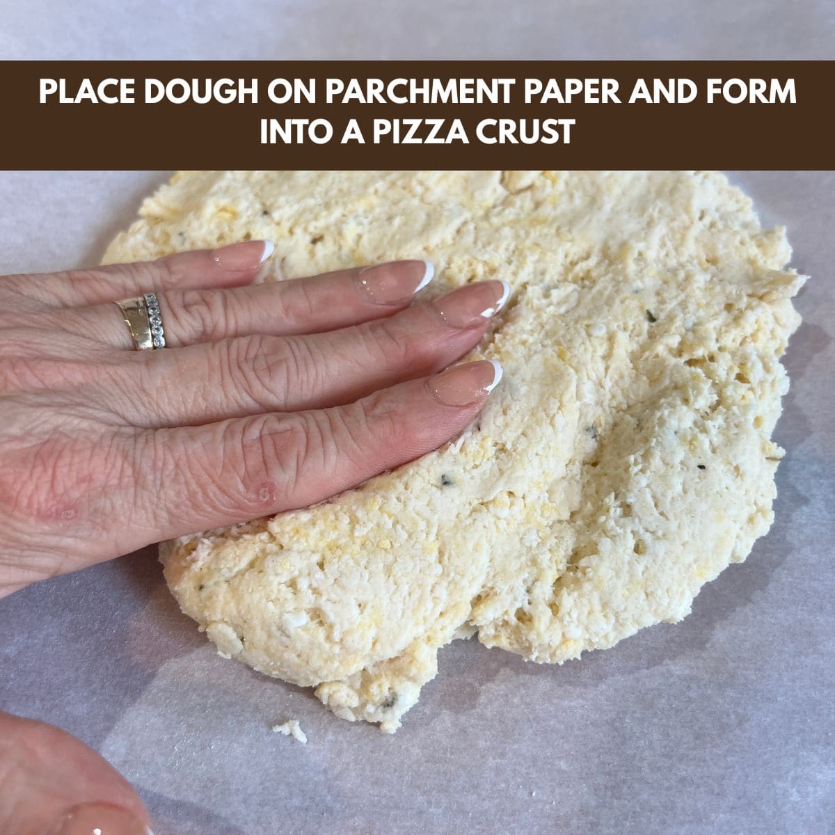 Cottage cheese pizza dough on parchment paper