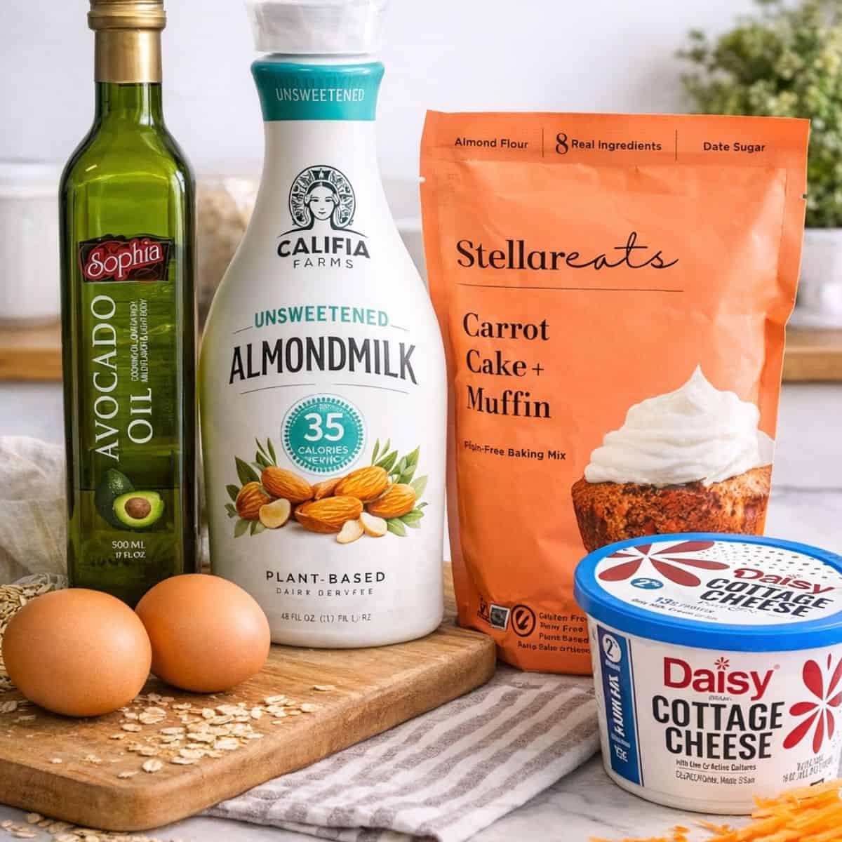 Stellar ears carrot cake muffin mix avocado oil almond milk cottage cheese and eggs on a table to make carrot cake. muffins