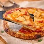A slice of chicken keto crust pizza
