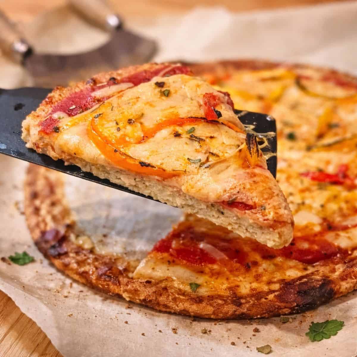 A slice of chicken keto crust pizza