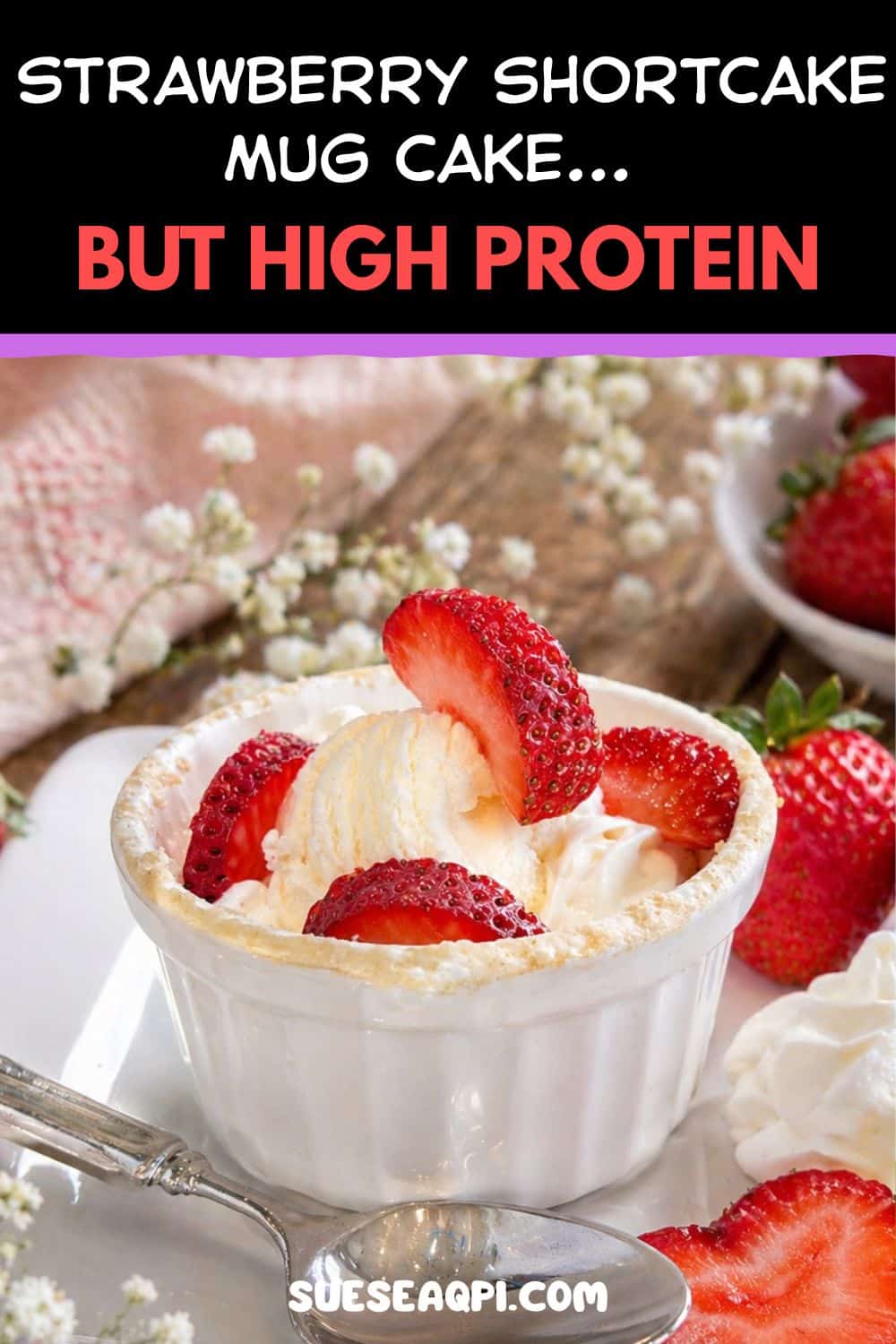 High protein strawberry shortcake mug cake made in a microwave-safe mug with oat flour, fresh strawberries, whipped cream, and a fluffy cake-like texture