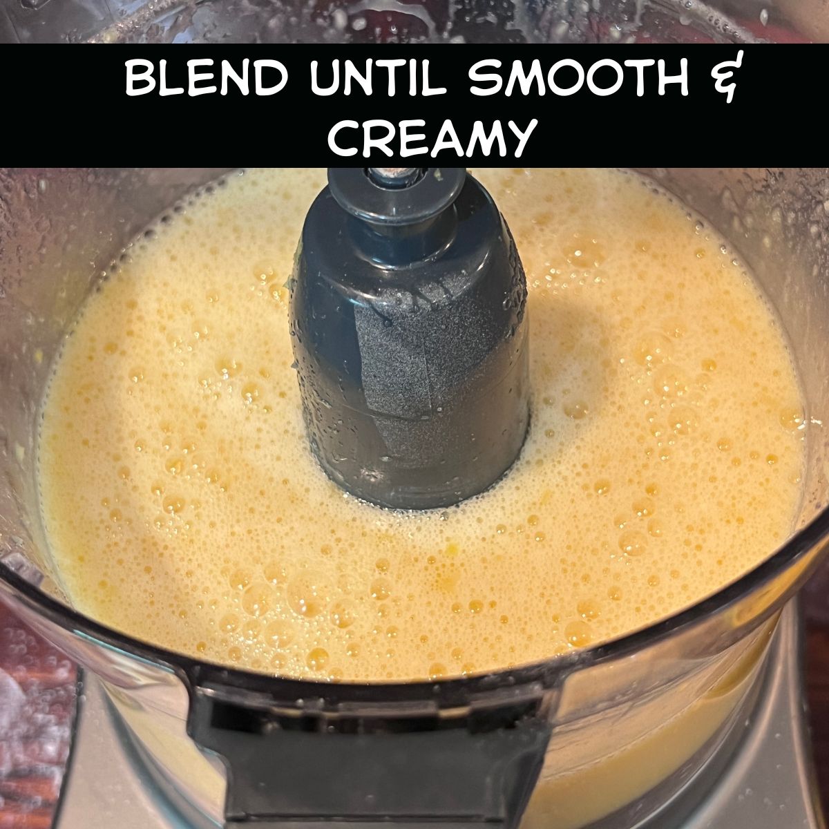 Lemon filling mixture blended smooth in a food processor for lemon bars