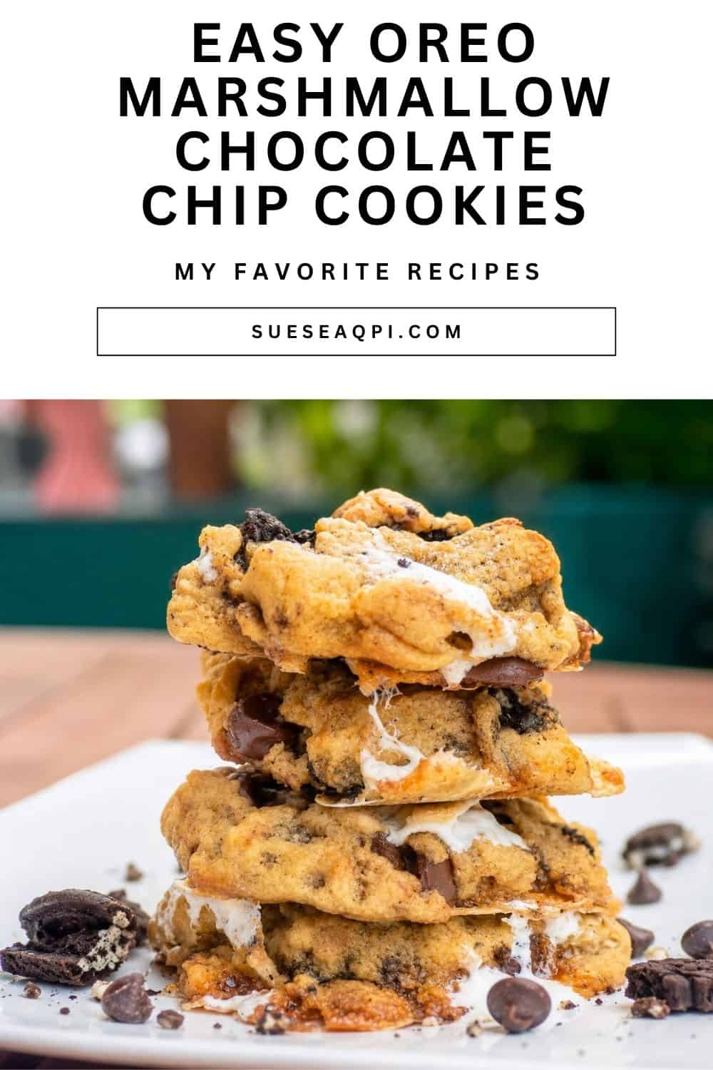 Stack of three gooey chocolate chip marshmallow Oreo cookies filled with melted marshmallows and Oreo cookie pieces.