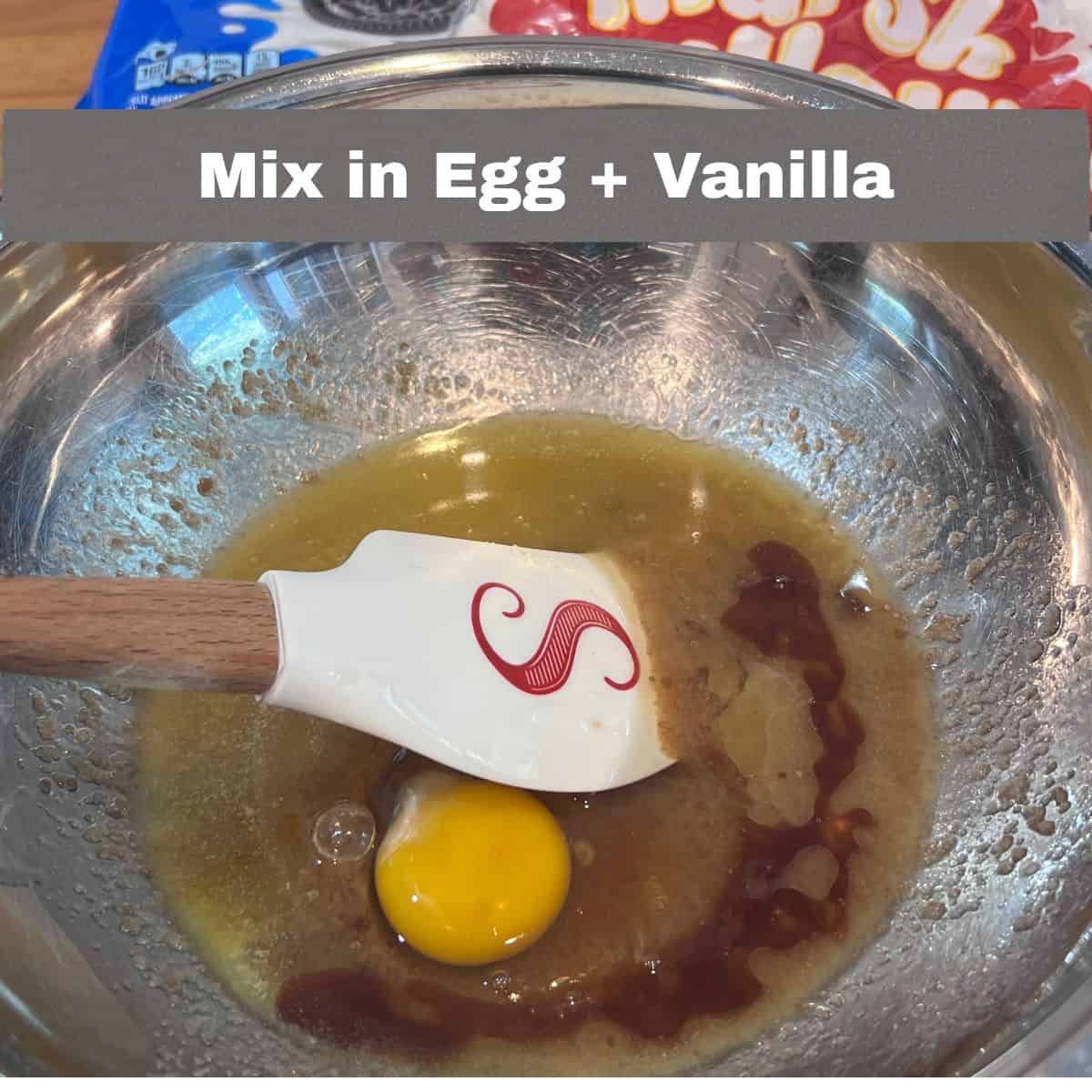 Egg and vanilla added to the butter and sugar mixture for Oreo chocolate chip marshmallow cookies