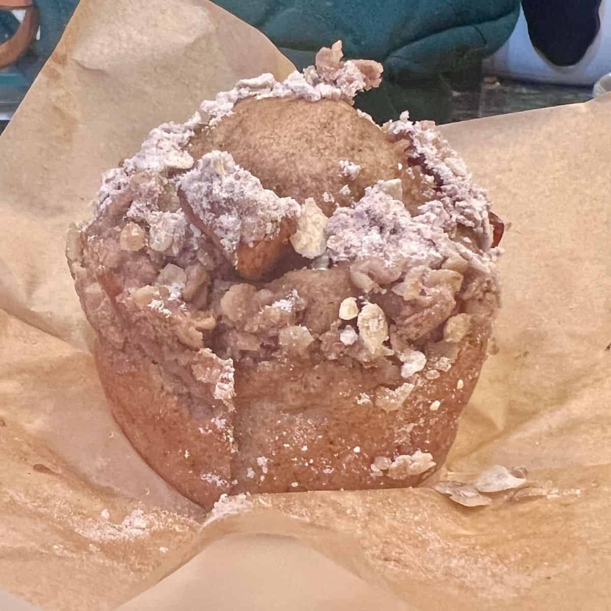 Freshly baked healthy apple fritter muffins with cinnamon streusel