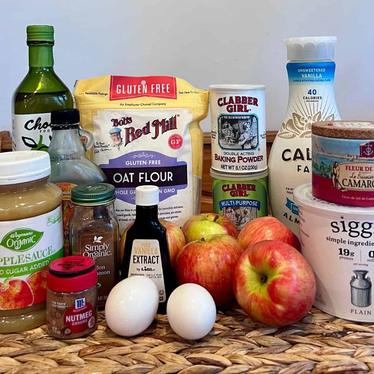 Ingredients for healthy apple fritter muffins with cinnamon streusel and maple glaze