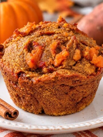 Healthy pumpkin sweet potato muffin made with oat flour and maple syrup