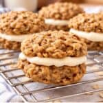 Healthy oatmeal cream pie cookies with creamy marshmallow filling on a cooling rack